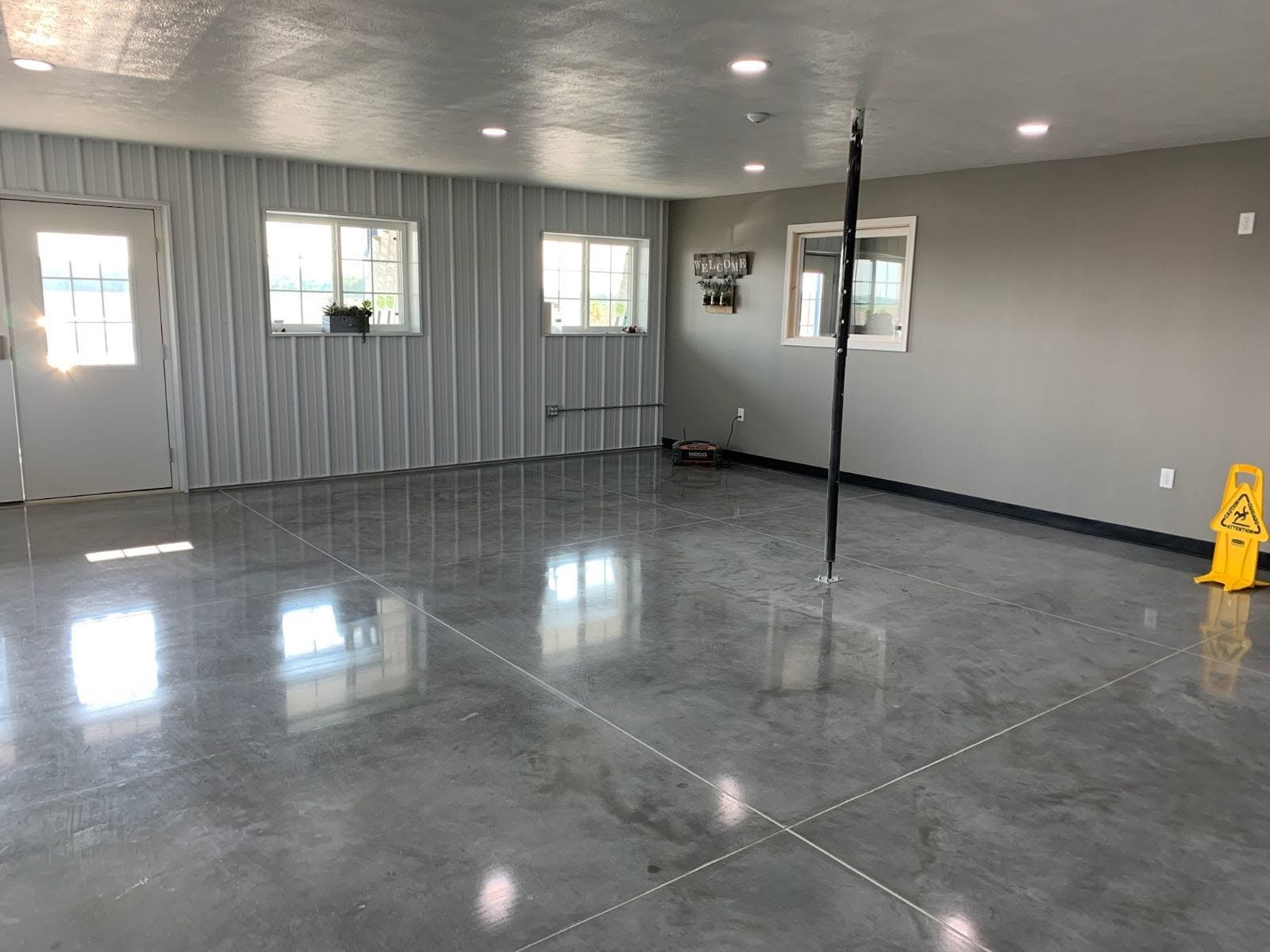 Close-up decorative flake floor protected by Squire